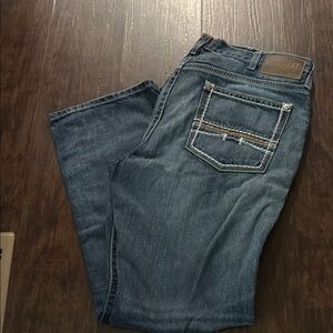 Ariat Blue relaxed boot cut Jeans with Natural Wear Patterns